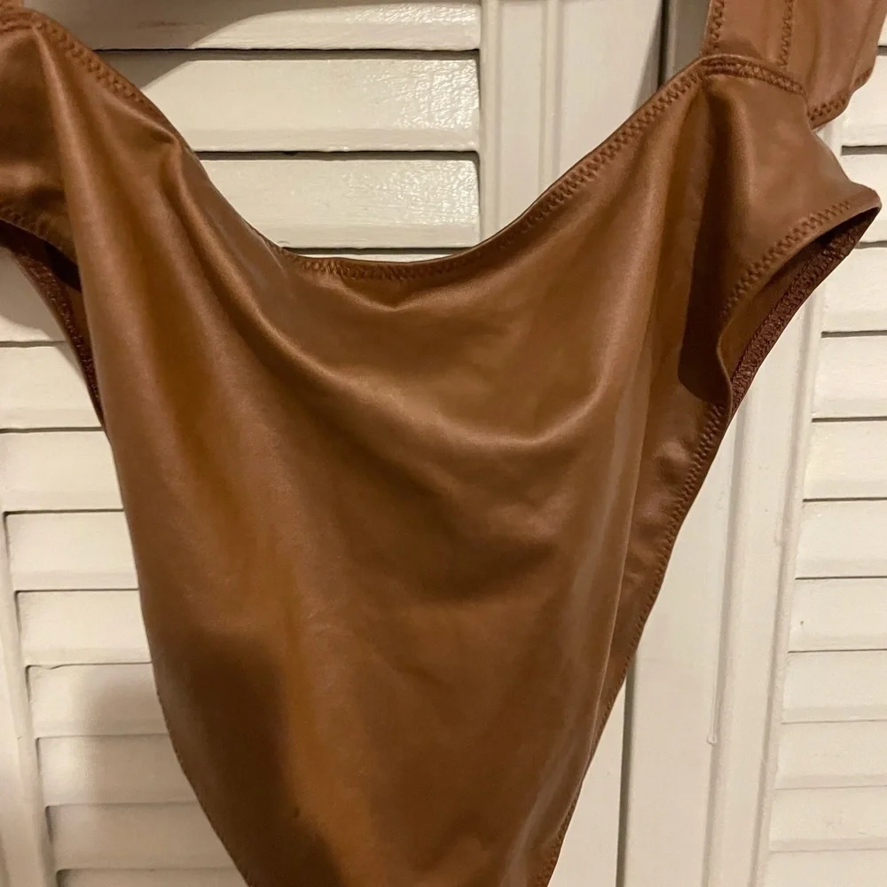 Skims swim cut out one piece suit